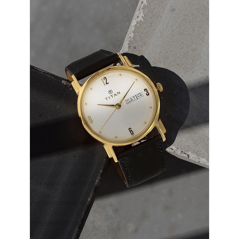 Titan Karishma Men Off White Analogue watch NL1445YL04