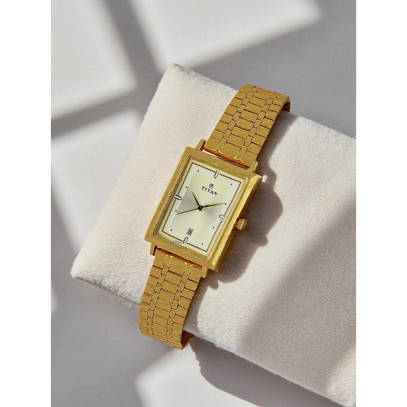 Titan Karishma Refresher Men Gold Analogue watch NL1715YM02